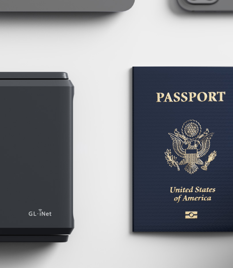 GL.iNet Slate 7 (GL-BE3600) 9 Slate 7 router behind american passport
