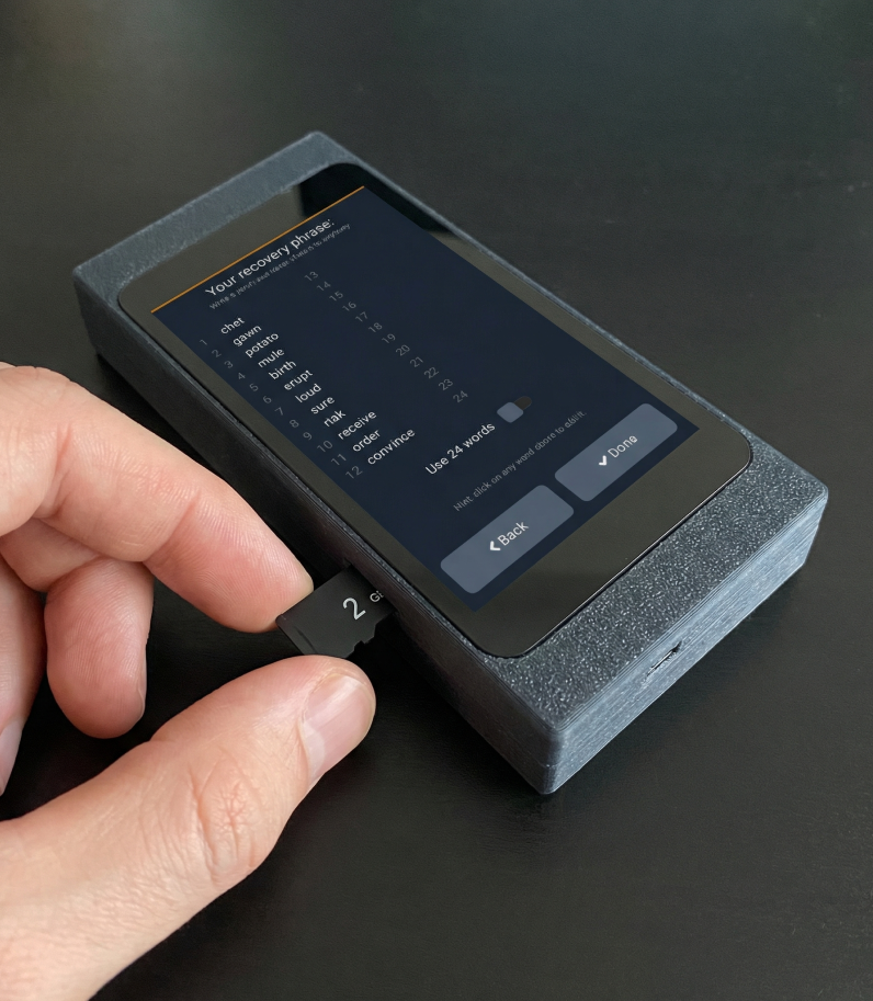 Specter DIY 16 Specter Diy hand insert the SD card to the device