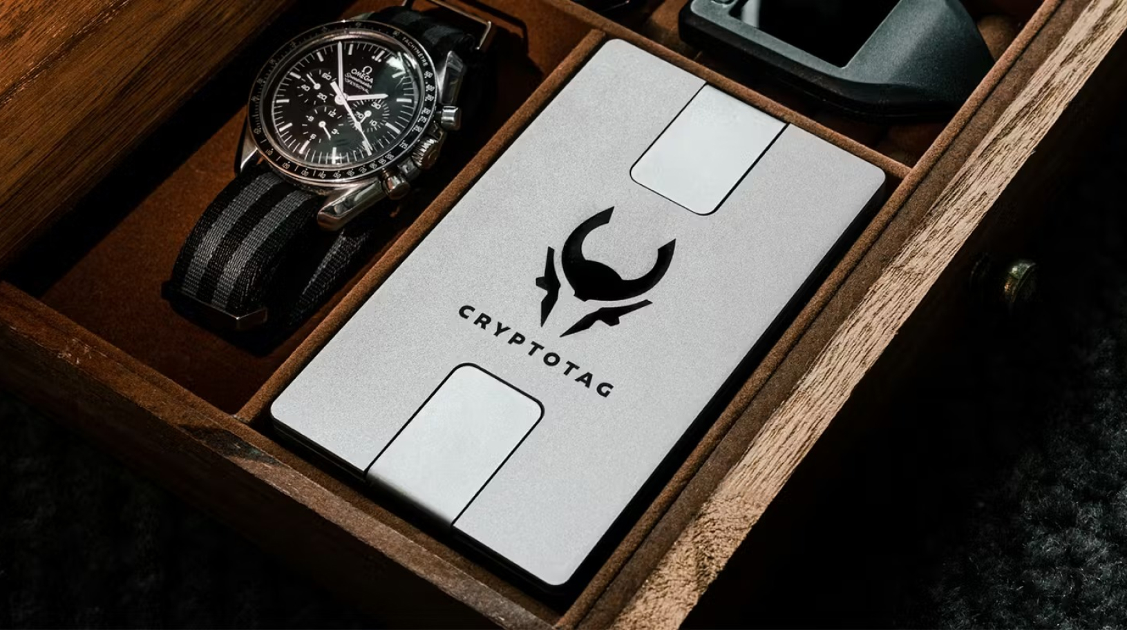CryptoTag Zeus 9 Cryptotag Zeus in box with expensive watch