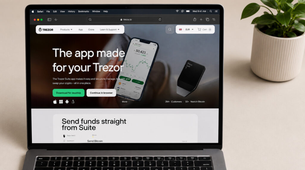 Офіційний сайт Trezor у браузері на Mac поруч із підключеним апаратним гаманцем